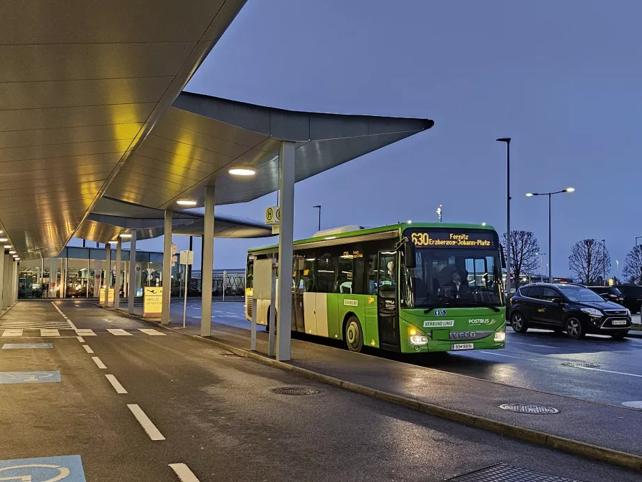 Bus stop 630 in front of the departure hall