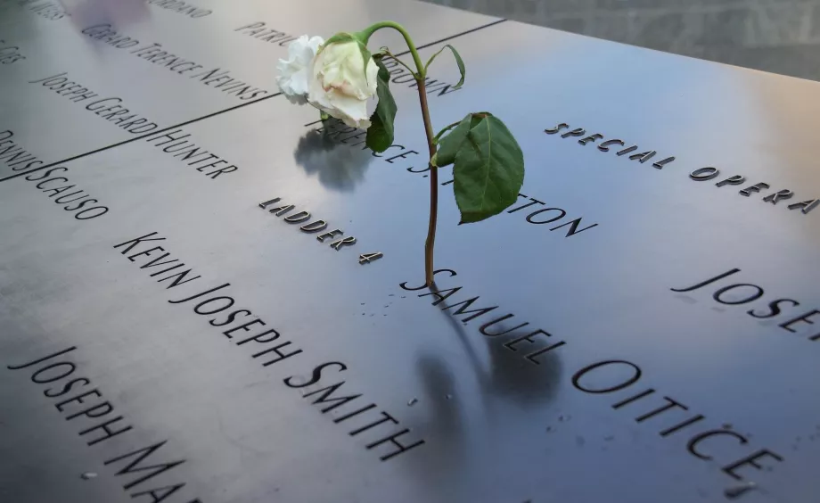 White rose by the victim's name