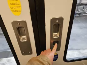 Black door release button on some RER sets