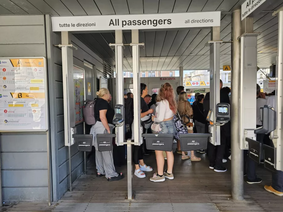 Turnstiles at the entrance to the dock in front of the station