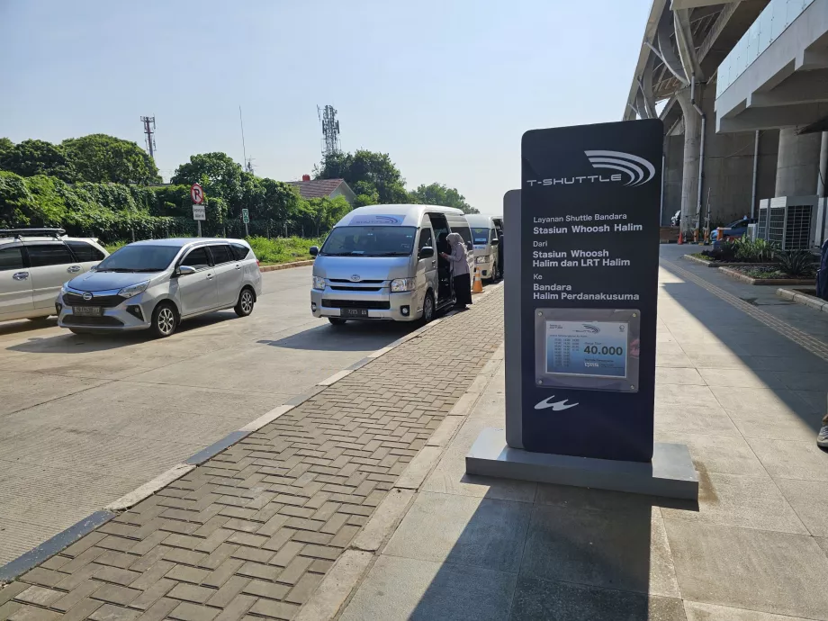 Halim airport bus stop in front of the fast train station