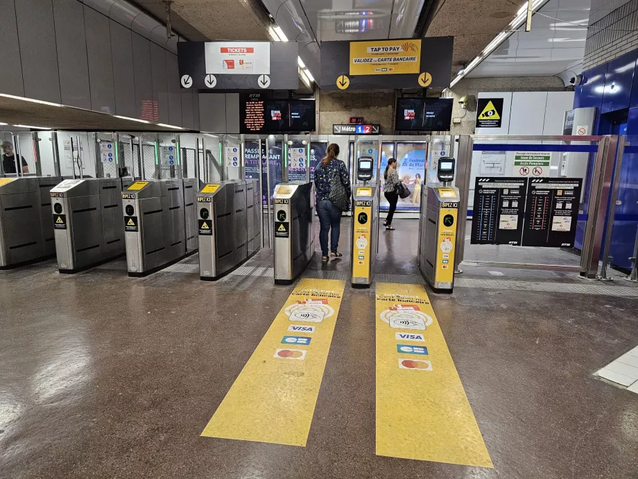 Turnstiles at the entrance to the metro station