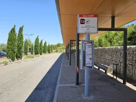 Bus stop in the direction of the airport