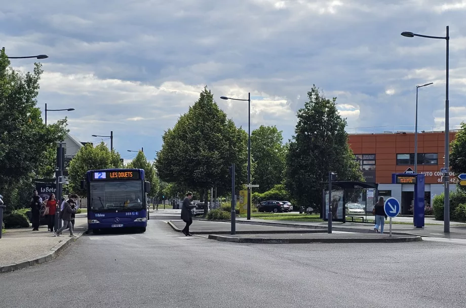 Bus line 2, stop in the direction of the centre on the right